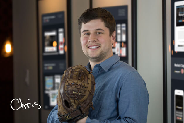 Headshot of Chris Brady holding baseball glove with his signature